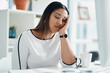 © Arnéll K/peopleimages.com - This work is really a bore. Shot of a young businesswoman looking bored while sitting at a desk in an office.