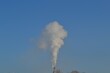 © Valerii - White smoke from a large chimney against the sky.