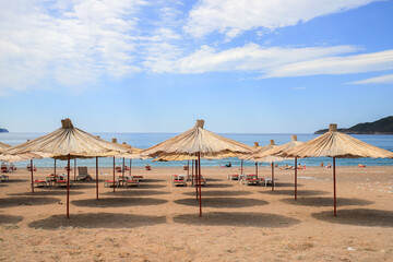 Wall Mural - Beautiful beach with sunshades in Montenegro