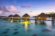 © JCB - Overwater bungalows at a luxury beach resort on Bora Bora, French Polynesia