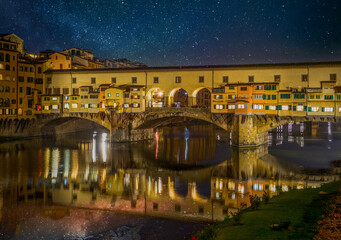 Wall Mural - Starry sky over world famous Ponte Vecchio in Florence