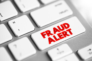 Fototapete - Fraud Alert text button on keyboard, concept background