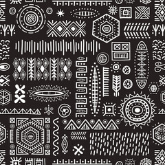 Black and white seamless background African art decoration tribal geometric shapes pattern. Pen and ink drawing of ancient ethnic traditional symbols. Hand-drawn oriental elements in doodle style.