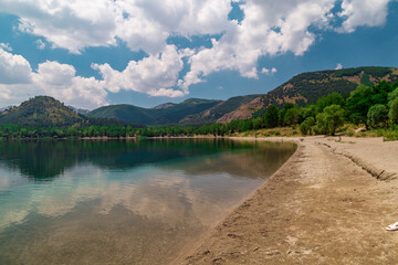 Wall Mural - Crater lake in Golcuk Isparta/Turkey. Reflection of blue sky lake, spring 