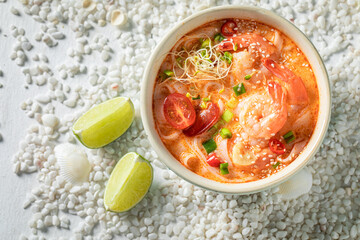 Wall Mural - Fresh Tom Yum soup with coconut milk and shrimps.