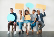 © Arnéll Koegelenberg/peopleimages.com - They are quite outspoken. Shot of a diverse group of creative employees holding up speech bubbles inside.