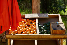 Farmer's Roadside Fruit Stand Selling Oranges And Avocados