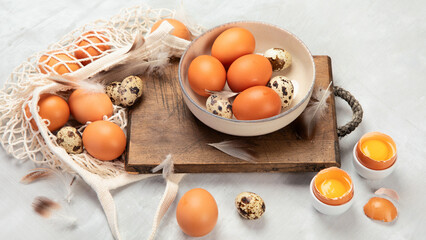 Wall Mural - Chicken eggs composition on gray background.