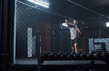 Sticker - You saw the kickboxing legend here first. Shot of a young man practicing his kickboxing routine at a gym.