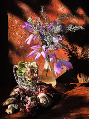 Wall Mural - Autumn bouquet in a glass flask with colchicum flowers