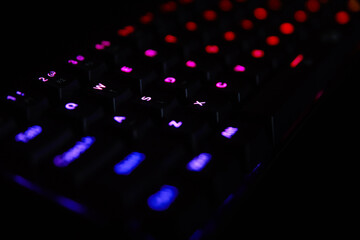 Fototapete - Gaming keyboard, close up. Mechanical rgb keyboard for computer games on dark backgound