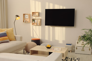 Canvas Print - Modern TV, comfortable sofa and decor elements in living room