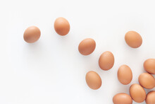 Brown Eggs On White Background.