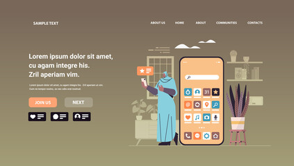 Poster - arab woman holding smartphone girl using online mobile app social media communication concept