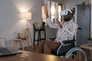Aufkleber - Contemporary software developer in vr headset touching virtual display while sitting in wheelchair and working from home