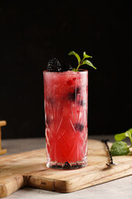 One Long Glass With Non-alcoholic Mocktail Version Of The Classic Blackberry And Gin Cocktail Bramble On Wooden Board, Cocktail Equipment