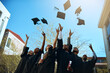 © Jadon Bester/peopleimages.com - Goodbye college, hello career. Shot of a group of young students throwing their hats in the air on graduation day.