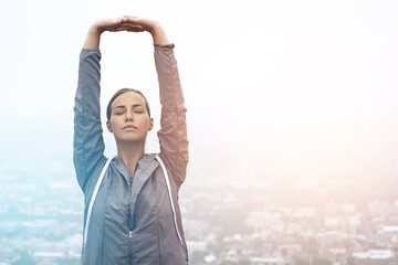 Canvas Print - Adventure is not outdoors, its within. Shot of a young woman stretching before a morning run.