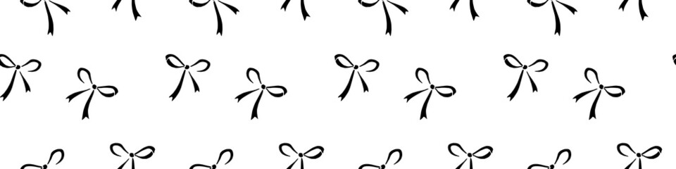 Wall Mural - Seamless pattern with small black flat bows, ribbons. Cute fun simple abstract vector background, texture for fabric, wrapping paper, girls design