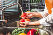 © joyfotoliakid - Hand of maid washing tomato fresh vegetables preparation healthy food in kitchen
