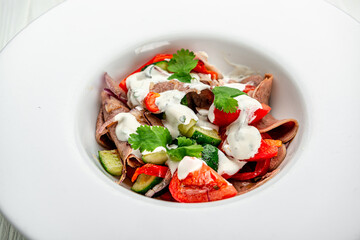 Wall Mural - Beef tongue salad with fresh vegetables.