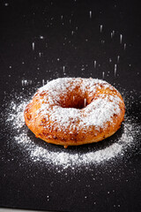 Wall Mural - donut on the black background