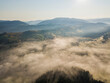© Sergey - Morning fog in the Ukrainian Carpathians. Aerial drone view.