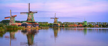 Panoramic View Of A Couple Of Dutch Windmills