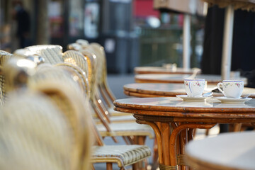 Two cups of espresso coffee on a coffee shop terrace from Paris, France.