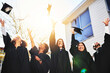 © Delmaine Donson/peopleimages.com - Hats off to ourselves. Cropped shot of a group of students throwing their caps into the air after graduating.