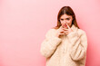 © Asier - Young caucasian woman isolated on pink background making up plan in mind, setting up an idea.