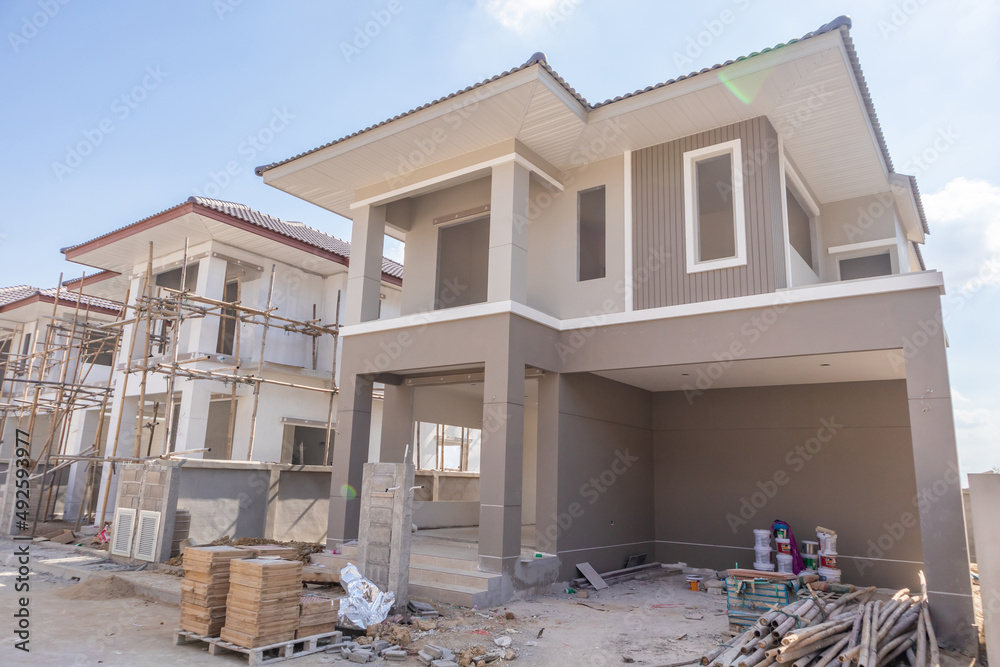 House Development Images construction residential new house in progress at building site housing ...