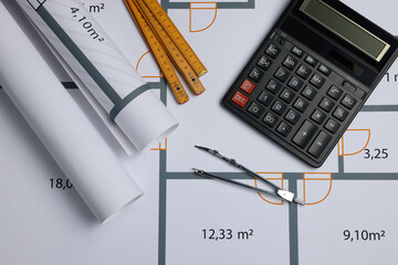 Wall Mural - Construction drawings, pair of compasses, calculator and folding ruler on house plan, flat lay. Architect workspace