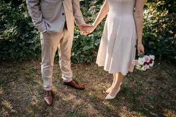 Wall Mural - Just married. Happy couple. This day is the first of many beautiful days together.