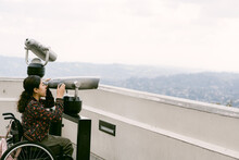 Young Woman In A Wheelchair Sightseeing In Los Angeles
