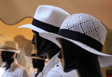 Italy: Black Mannequins With White Hat.
