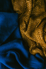 Deep, Rich Jewel Tone Cobalt Blue Fabric Next To Gold Sequined Cloth Scarf