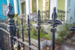 Close up of a beautiful iron fence in the Marigny neighborhood of New Orleans.