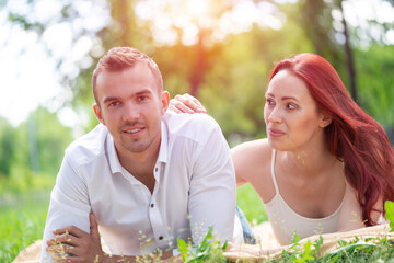 Wall Mural - Young couple on a date in the park