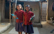 © IndiaPix - rural girls with book at her house, ready for school