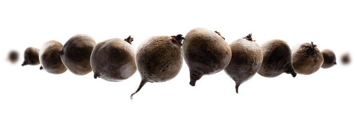 Wall Mural - Ripe beets levitate on a white background