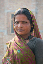 Portrait Of A Woman Labourer Working In An Urban Construction Site