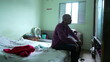 © Marco - A thoughtful African man in bedroom thinking about life during middle life 50s