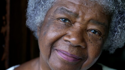 Poster - A happy senior African woman portrait face looking at camera