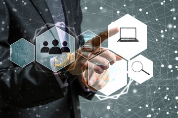 Poster - Businessman holds a smartphone with a Social network icon, Social media network, and marketing concept on virtual screen. Internet and business technology, Button power icon business web sign online.