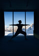 © pikoso.kz - Yoga practice meditation in the room with mountain view