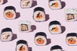 Minimal pattern sushi concept. Many different sushi pieces with salmon fish, tuna, squid, rice, cucumber, carrots and nori seaweed. Pastel pink background