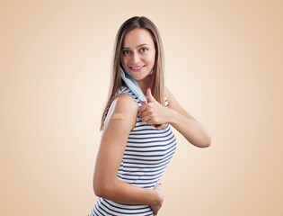 Poster - A woman showing shoulders after getting a vaccine. Happy with band-aids on after vaccine injection.