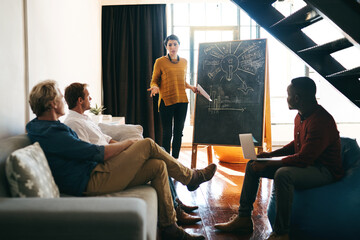 Poster - What are your thoughts on this plan. Shot of a businesswoman giving a presentation to her colleagues in an office.