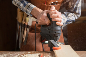 Carpenter Working At Workshop. High quality photo